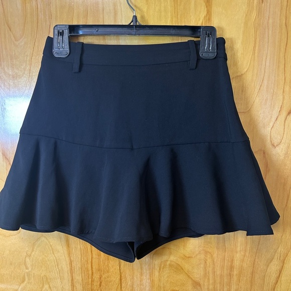 Black Women's Ruffle Hem Shorts - Picture 1 of 4
